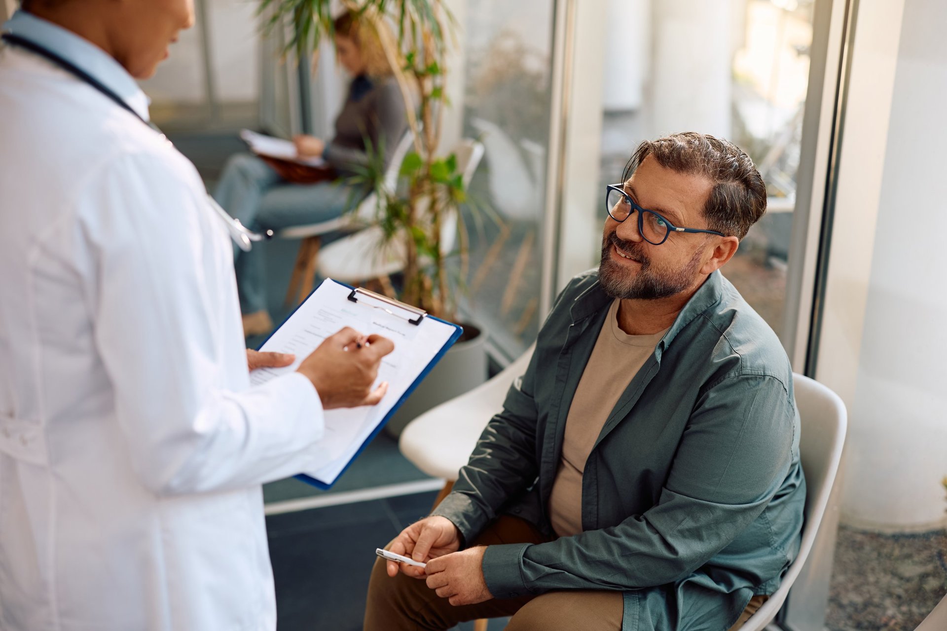 Doctor with patient