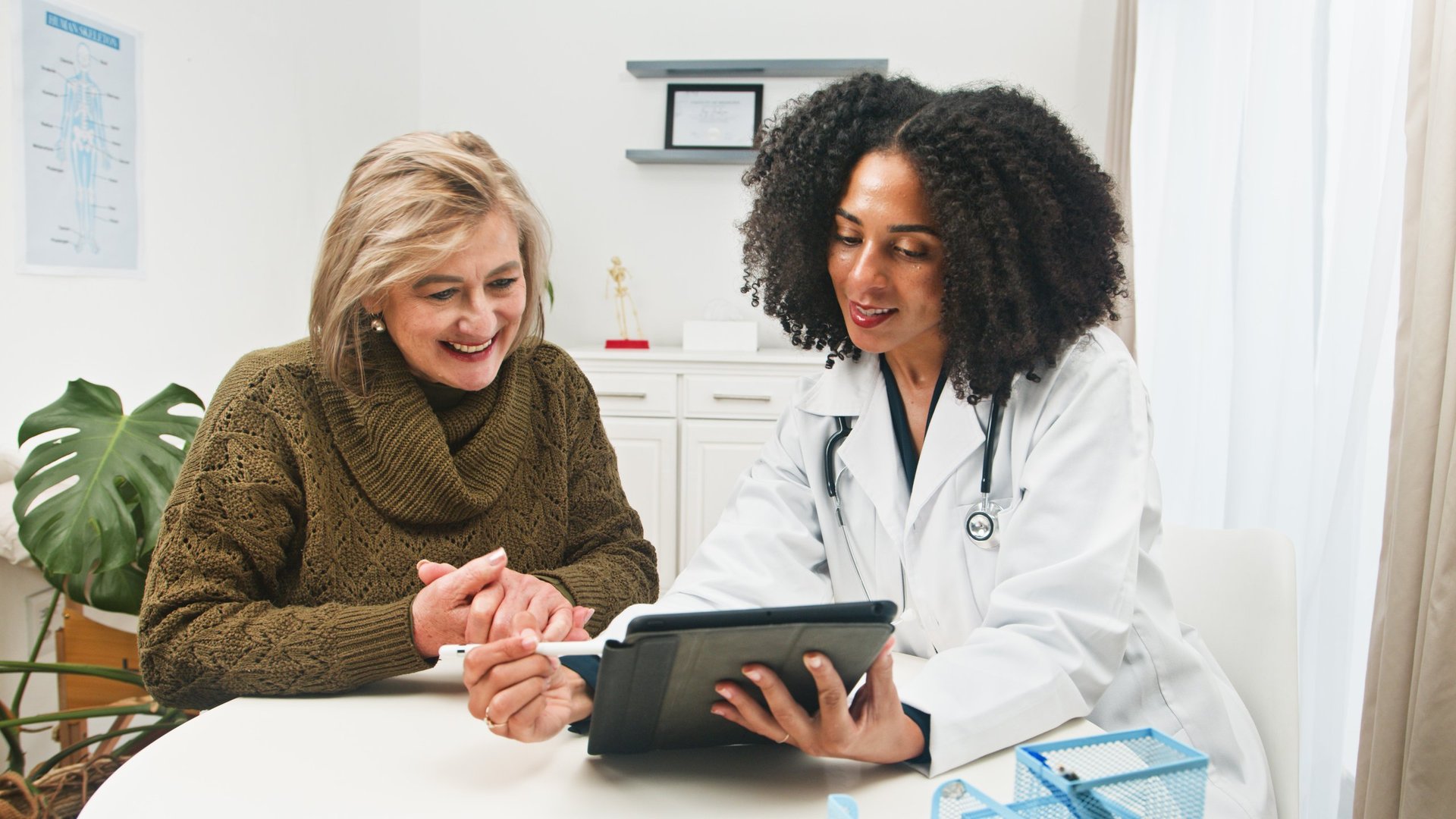 Dr. Mason-Eastmond consulting with a patient
